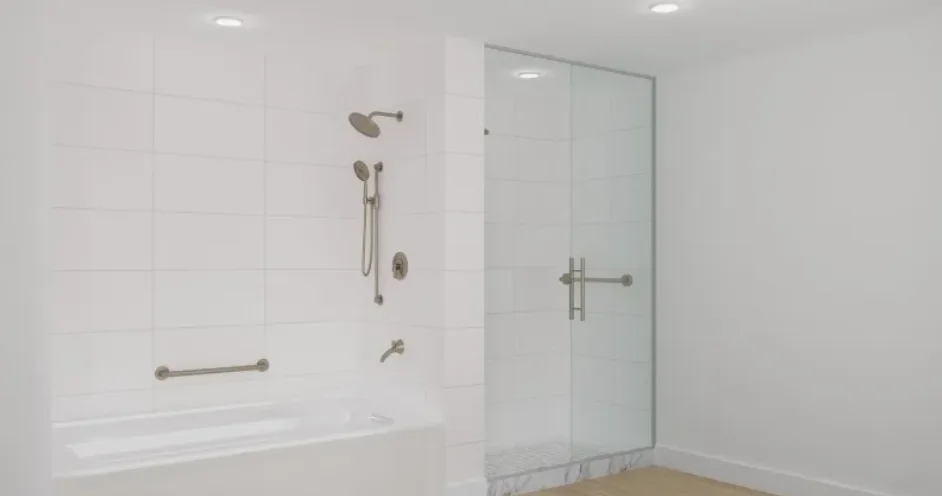 Bathroom with soaking tub and glass-enclosed shower